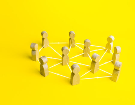 people connected by lines on a yellow background